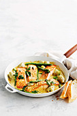 One-pan salmon with cream and artichokes