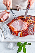 Cutting glazed ham