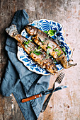 Fried trout with fresh herbs