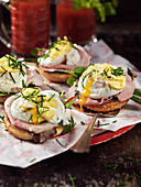 Open faced ham sandwiches with Eggs Benedict and Bloody Marys for brunch