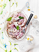 Herring with red onions, bay leaves, red onions and schnapps (Sweden)