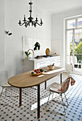Classic tiled floor in Mediterranean kitchen-dining room
