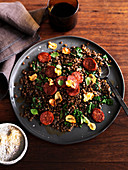 Green lentils with salami and cavolo nero