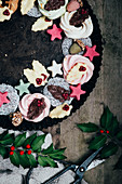 A Christmas wreath made from Christmas sweets (seen from above)