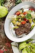 Beef fillet with vegetables and sprouts