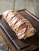 Raw, stuffed pork fillet wrapped in Parma ham (Tuscany)