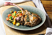 Tomahawk chop with grilled vegetables