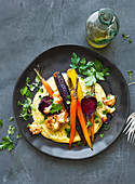 Oven-roasted vegetables with feta cheese and polenta