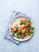 Quinoa risotto with fried salmon and prawns