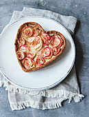 A heart-shaped, sugar-free apple rose cake