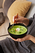Cream of pea soup with grappa and chilli