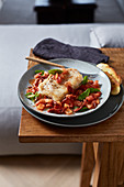 Cod with basil and tomatoes