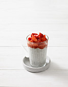 Chia and quark pudding with strawberry sauce