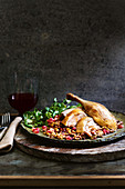 Roast duck with walnut and freekeh stuffing