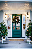 Festively decorated entrance area and front door