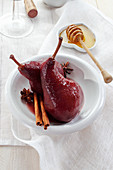 Red wine infused pears with cinnamon, star anise and honey