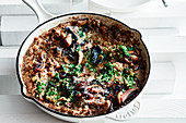 Mushroom quinoa risotto with hazelnut gremolata