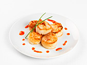 Fried scallops with pepper sauce