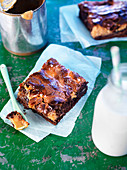 A brownie with dulce de leche on paper