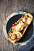 Oven-baked aubergine with vegetables and cheese