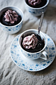 Vegan chocolate mug cake with raspberry chia cream