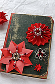 Vintage-style Christmas arrangement of bead and paper stars
