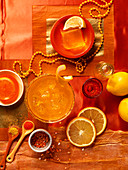 Orange jelly and orange juice on an orange background