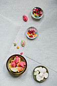 Candys for Easter in small bowls on a white background