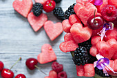 Watermelon hearts, cherries, raspberries and blackberries