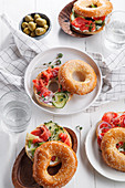 Bagels with salmon fish, cream cheese, cucumber and fresh radish slices