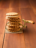 A stack of biscuits on a wooden table