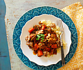 Lamb tagine with carrots, walnuts and couscous