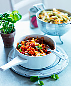 Pasta sauce with diced vegetables and basil
