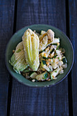 Steamed zucchini with fried zucchini flowers