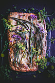 Roasted spring onion and fennel-flower focaccia with blue cheese
