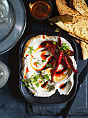 An aubergine dip made from grilled aubergines with pepper oil and chillis