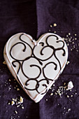 A heart-shaped biscuit with icing