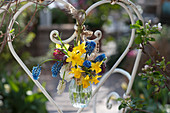 Colorful Spring Bouquet Tied To Back Of The Chair