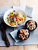 Fruity coleslaw and marinated prawns with chili and garlic