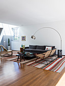 Various designer furnishings in earthy colours in living room