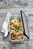 Winter couscous with tomatoes, dried apricots and herbs