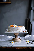 Peach pie on a table in a rustic kitchen