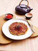 Okonomiyaki, pikanter japanischer Pfannkuchen