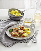 Monkfish in white wine and tomato sauce with potatoes