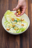 Lettuce hearts with croutons and sour cream dressing