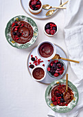 Macadamia, chocolate, vanilla pots with mixed frozen berries