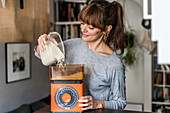 Woman weighing rice