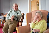 Care home residents laughing