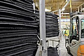 Rubber sheets in tyre factory, UK