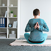 Pregnant woman practicing yoga